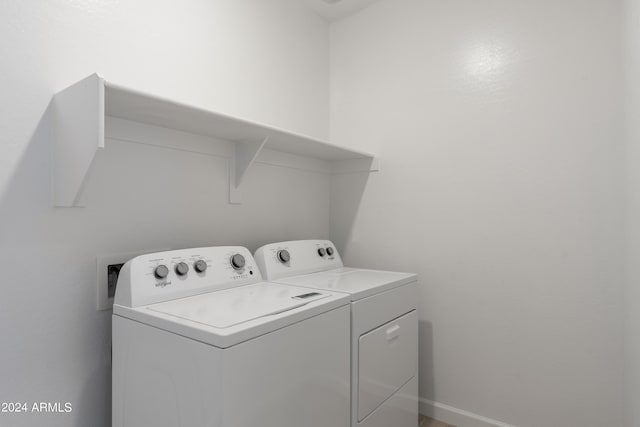 40040 W Agave Rd, Maricopa, AZ 85138 - laundry area featuring washer and clothes dryer