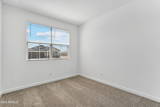 40040 W Agave Rd, Maricopa, AZ 85138 - unfurnished room featuring baseboards and carpet