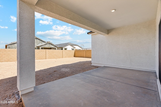 40040 W Agave Rd, Maricopa, AZ 85138 - fenced backyard featuring a patio