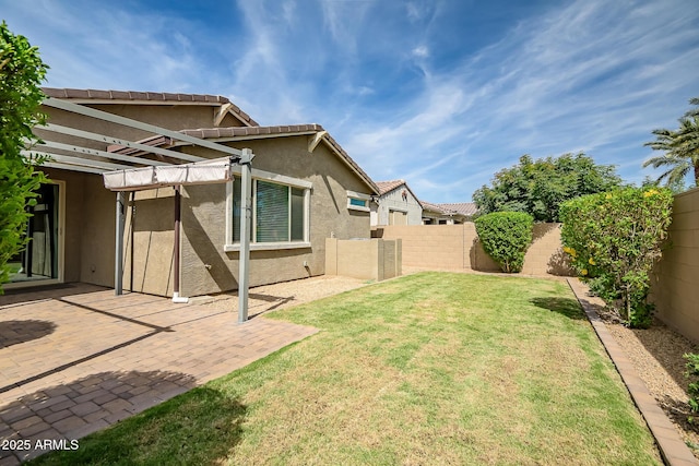 view of yard featuring a patio, a pergola, and a fenced backyard