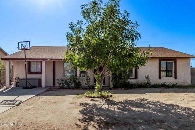 7357 W Cheryl Dr, Peoria, AZ 85345 - single story home with stucco siding and a shingled roof