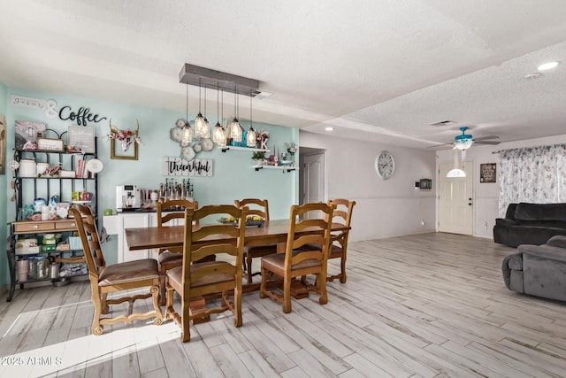 7357 W Cheryl Dr, Peoria, AZ 85345 - dining space featuring ceiling fan, light wood-style flooring, a textured ceiling, visible vents, and recessed lighting