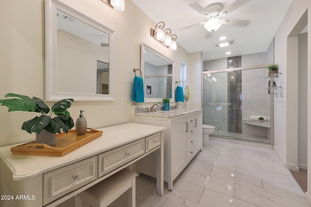 bathroom with a stall shower, visible vents, toilet, marble finish floor, and vanity