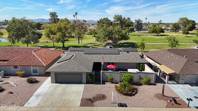 birds eye view of property featuring a mountain view and golf course view