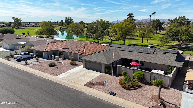 birds eye view of property featuring a mountain view