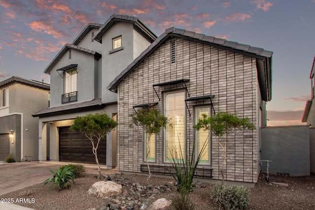 view of front of house with a garage