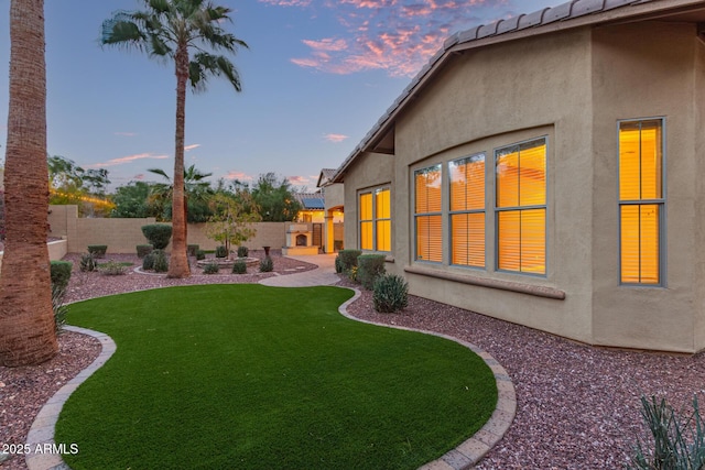 view of yard featuring a patio area and a fenced backyard