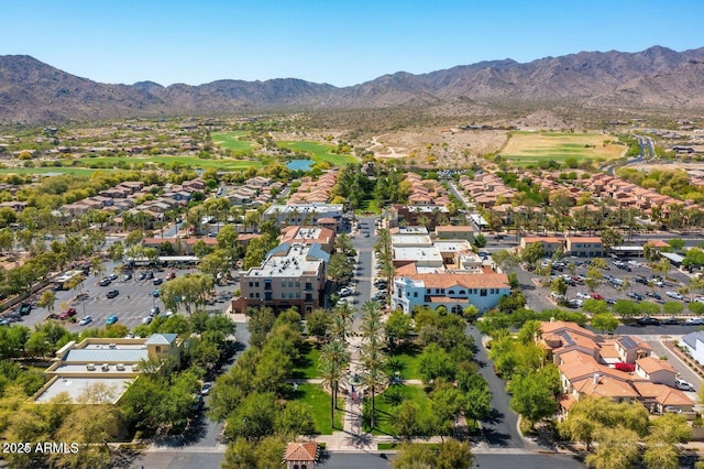 drone / aerial view with a residential view and a mountain view