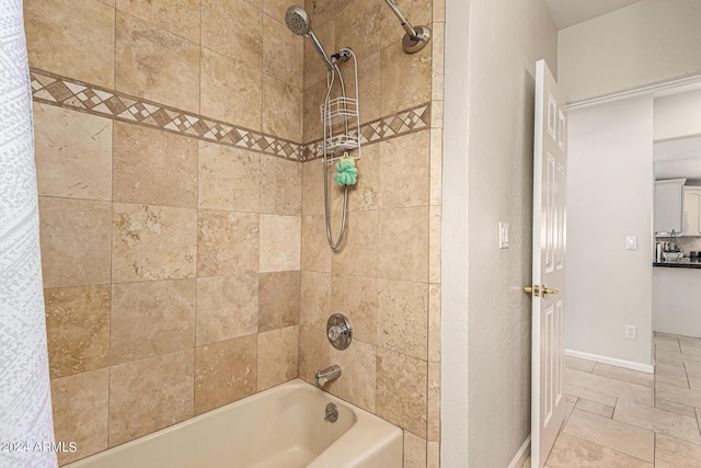 bathroom with shower / tub combo with curtain