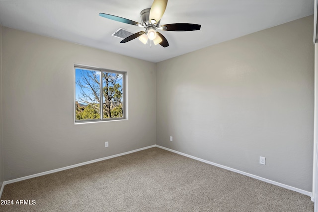 unfurnished room with carpet floors and ceiling fan