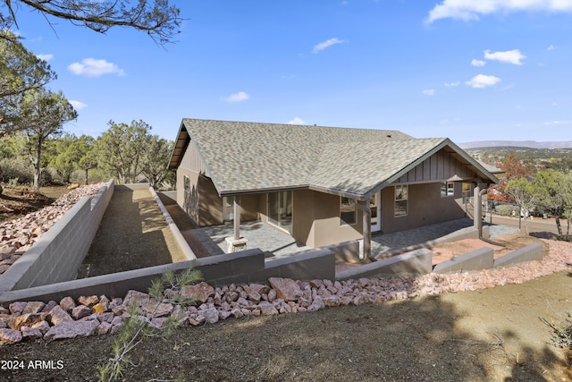1124 S Sycamore Cir Unit 1, Payson, AZ 85541 - rear view of house featuring a shingled roof and a patio