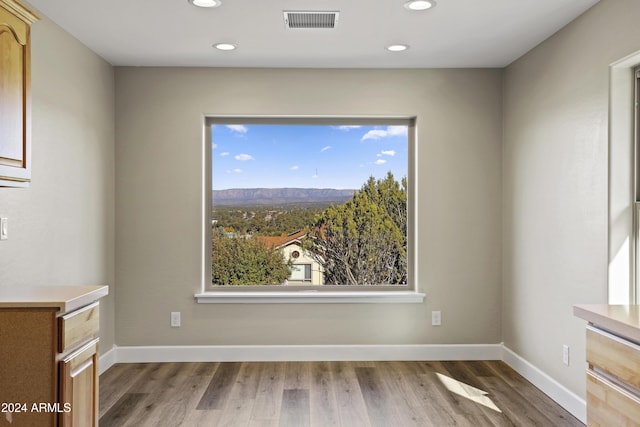 1124 S Sycamore Cir Unit 1, Payson, AZ 85541 - spare room with recessed lighting, wood finished floors, and baseboards