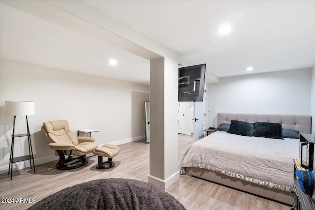 bedroom featuring light wood-type flooring