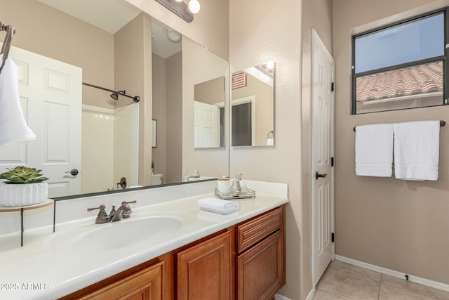 6936 E Snowdon St, Mesa, AZ 85207 - full bathroom featuring a shower, vanity, and tile patterned flooring