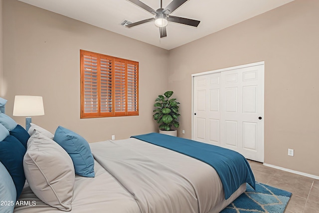 6936 E Snowdon St, Mesa, AZ 85207 - tiled bedroom featuring a closet and ceiling fan