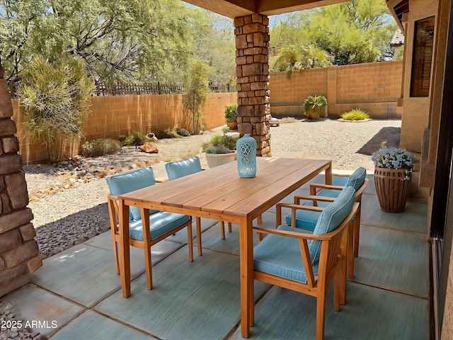 6936 E Snowdon St, Mesa, AZ 85207 - fenced backyard with outdoor dining space and a patio