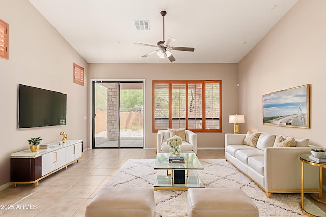 6936 E Snowdon St, Mesa, AZ 85207 - living area featuring plenty of natural light, a ceiling fan, and light tile patterned floors