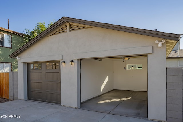 garage featuring fence