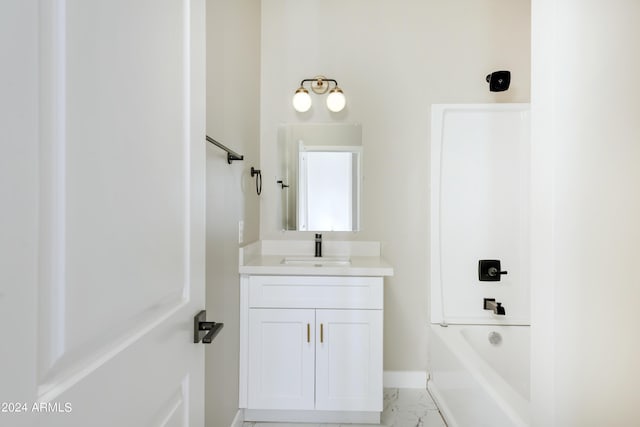 full bath featuring shower / bathing tub combination, baseboards, marble finish floor, and vanity