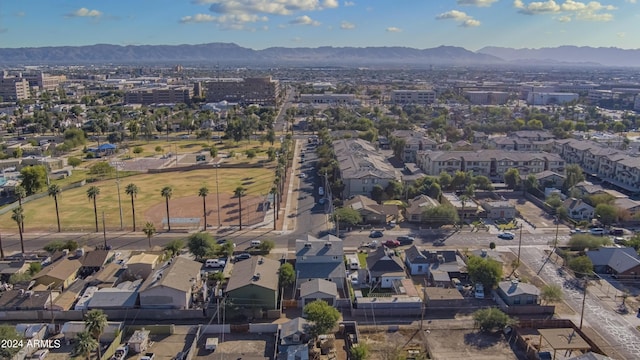 birds eye view of property featuring a mountain view and a residential view