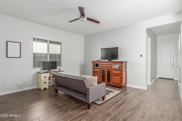 9764 E Thornbush Ave, Mesa, AZ 85212 - living area featuring wood finished floors, a ceiling fan, and baseboards