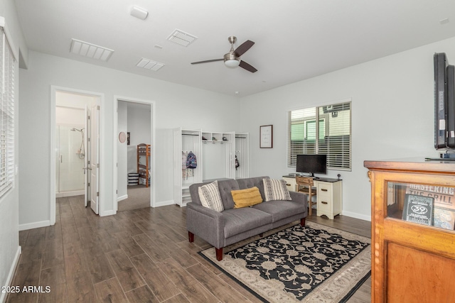 9764 E Thornbush Ave, Mesa, AZ 85212 - living room featuring a ceiling fan, dark wood-style floors, and baseboards