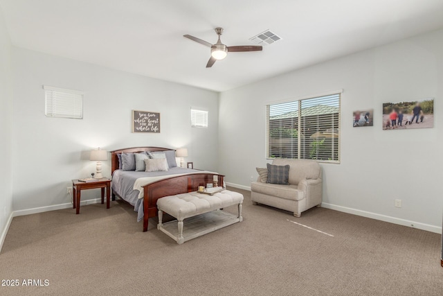 9764 E Thornbush Ave, Mesa, AZ 85212 - bedroom with baseboards, light carpet, and a ceiling fan