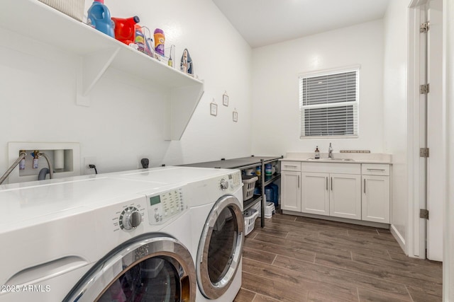 9764 E Thornbush Ave, Mesa, AZ 85212 - washroom featuring washing machine and dryer, dark wood-style floors, and cabinet space