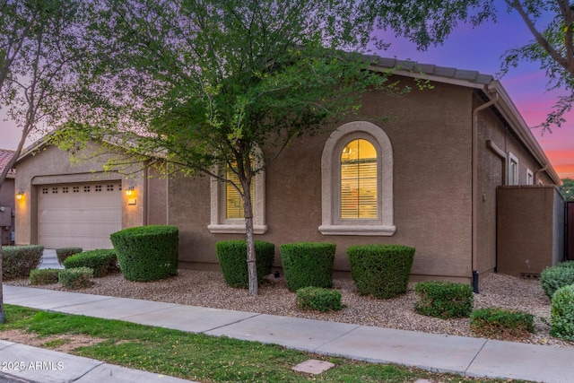 9764 E Thornbush Ave, Mesa, AZ 85212 - view of front facade featuring an attached garage and stucco siding