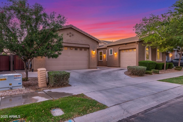 9764 E Thornbush Ave, Mesa, AZ 85212 - single story home with a garage, driveway, stucco siding, and a tiled roof
