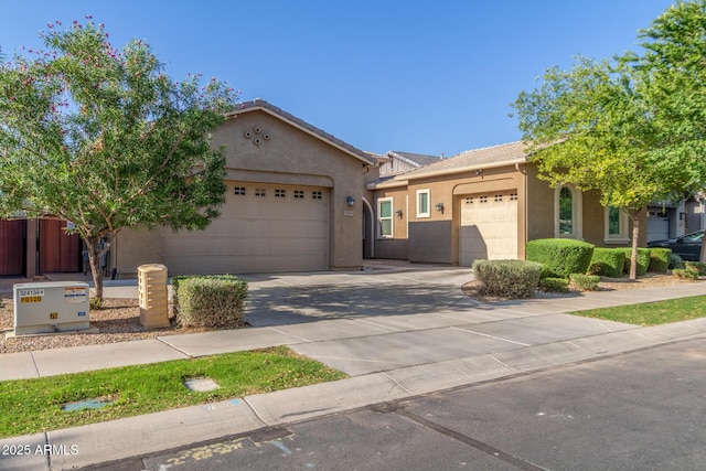 9764 E Thornbush Ave, Mesa, AZ 85212 - ranch-style home with a garage, concrete driveway, and stucco siding