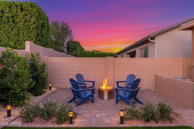 9764 E Thornbush Ave, Mesa, AZ 85212 - fenced backyard with an outdoor fire pit