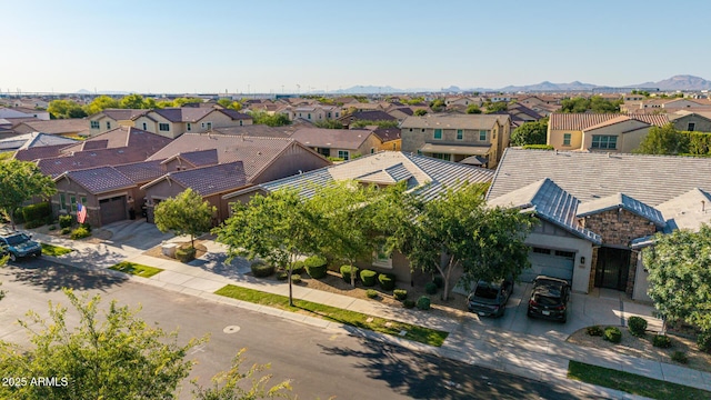 9764 E Thornbush Ave, Mesa, AZ 85212 - aerial perspective of suburban area with a mountainous background