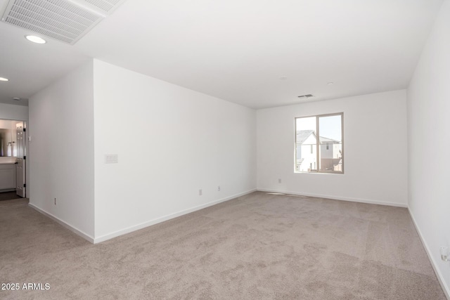 11627 W Green Dr, Youngtown, AZ 85363 - carpeted empty room with recessed lighting and baseboards