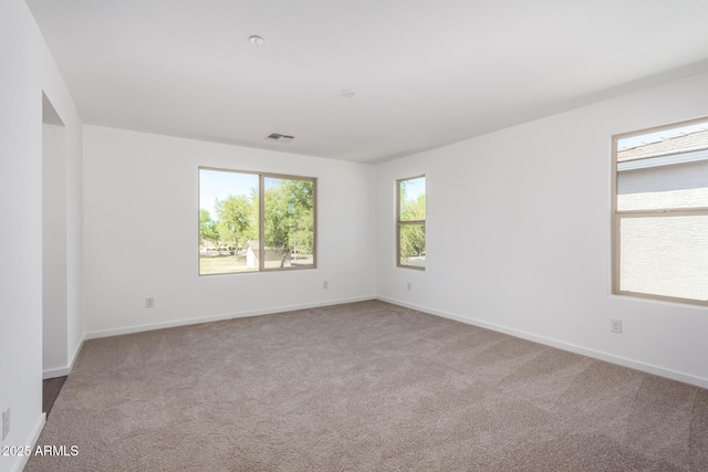 11627 W Green Dr, Youngtown, AZ 85363 - spare room with carpet flooring and baseboards