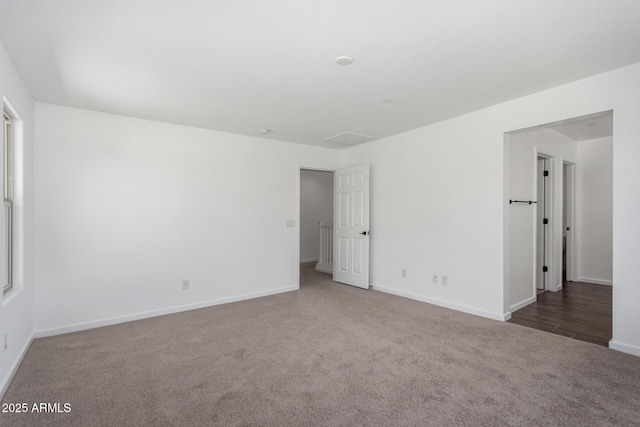 11627 W Green Dr, Youngtown, AZ 85363 - carpeted spare room featuring baseboards