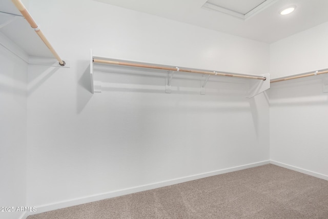 11627 W Green Dr, Youngtown, AZ 85363 - spacious closet featuring carpet floors