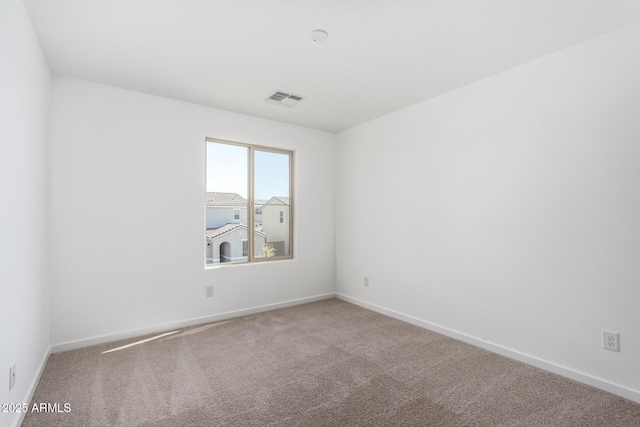 11627 W Green Dr, Youngtown, AZ 85363 - empty room with carpet and baseboards