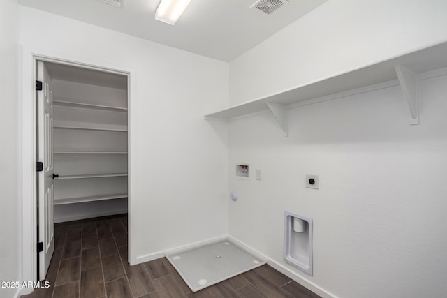 11627 W Green Dr, Youngtown, AZ 85363 - laundry room featuring washer hookup, hookup for a gas dryer, electric dryer hookup, wood tiled floors, and baseboards