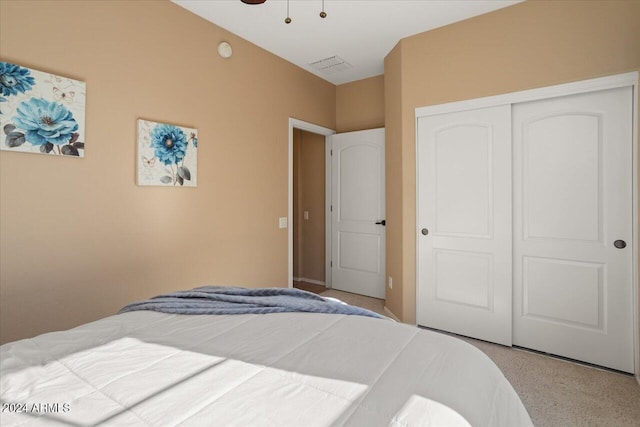 carpeted bedroom with a closet