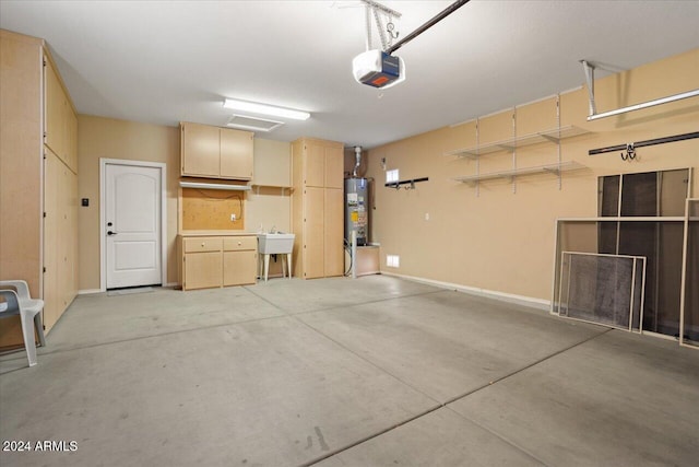 garage featuring gas water heater and a garage door opener