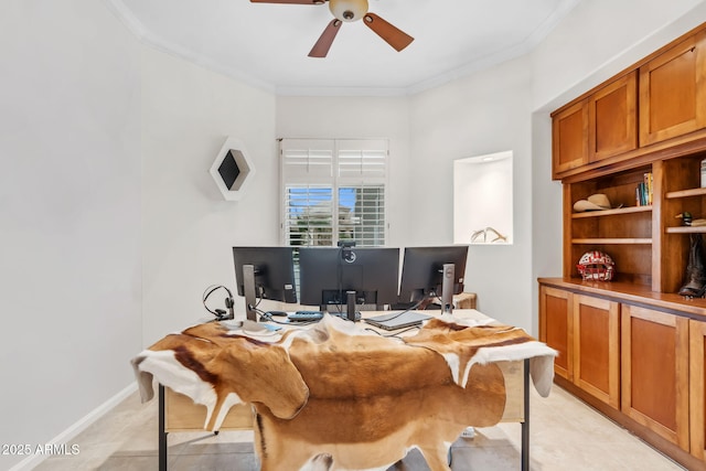 office with ornamental molding, light tile patterned floors, and ceiling fan