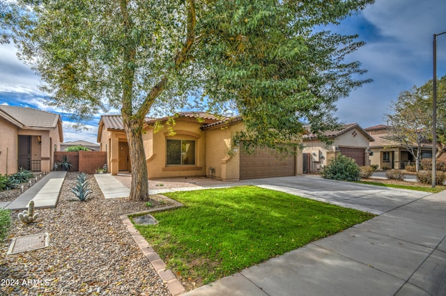 view of front of home with a garage