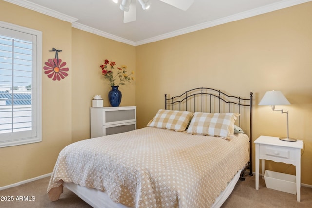 bedroom featuring ceiling fan, baseboards, carpet, and ornamental molding