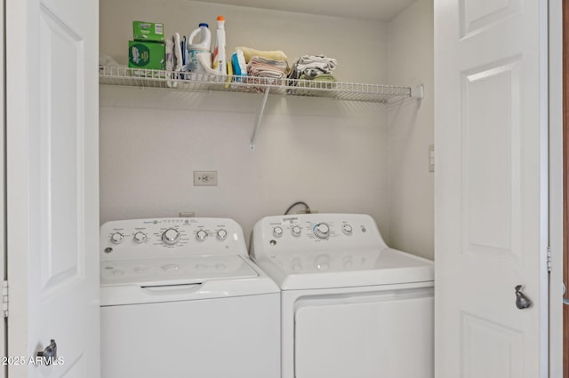 laundry area with washer and dryer and laundry area