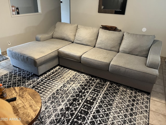 living area featuring light tile patterned flooring