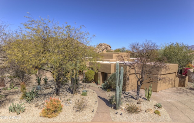 7322 E High Point Dr, Scottsdale, AZ 85266 - exterior space with driveway, stucco siding, and an attached garage