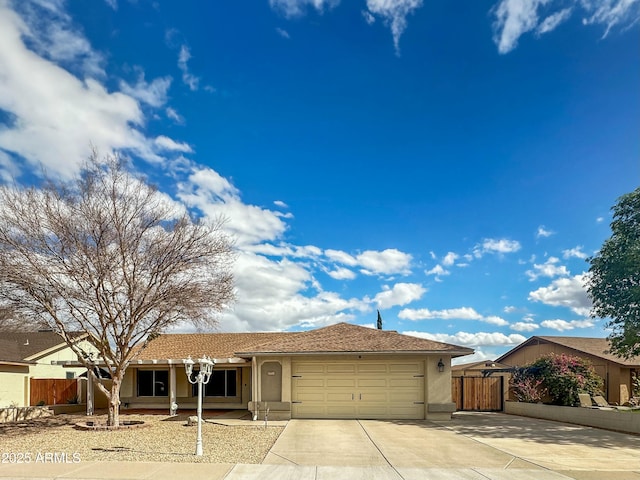 ranch-style home featuring a garage