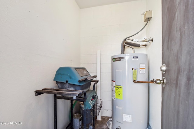 utility room with electric water heater