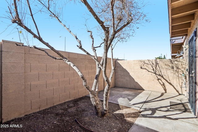 exterior details with a fenced backyard